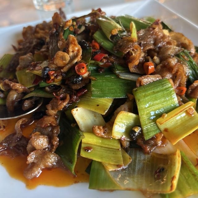 生爆盐煎肉 Sauteed Sliced Pork with Garlic Stem.