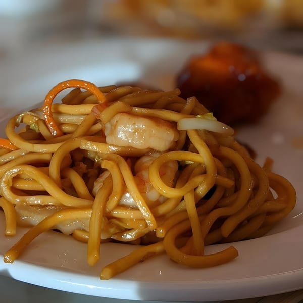 Close-up of Mainland China Bistro's shrimp lo mein with noodles, shrimp, and vegetables.