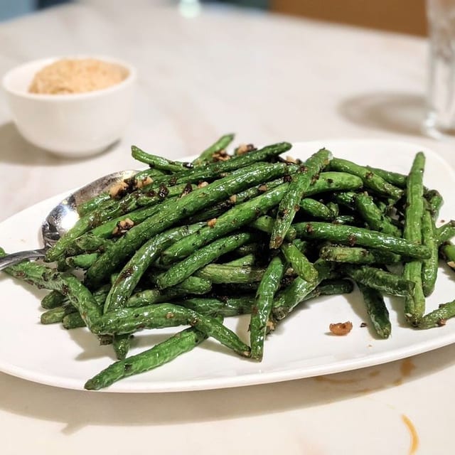干煸四季豆 Sauteed String Beans.