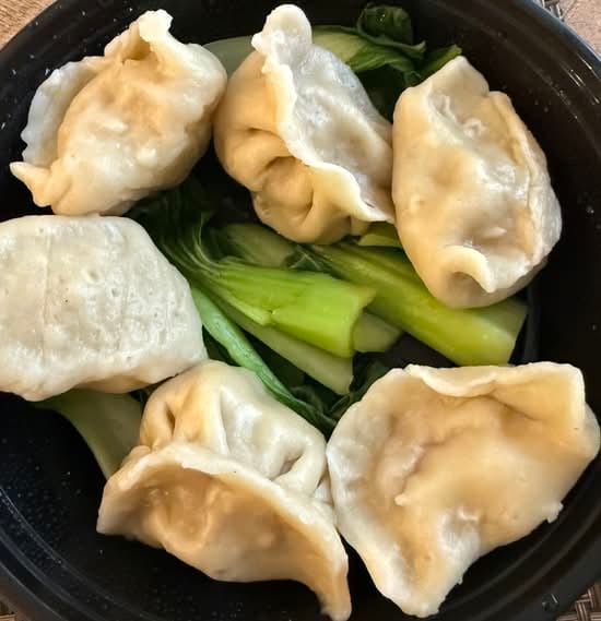 红油水饺 Pork Dumplings in Red Chili Oil.